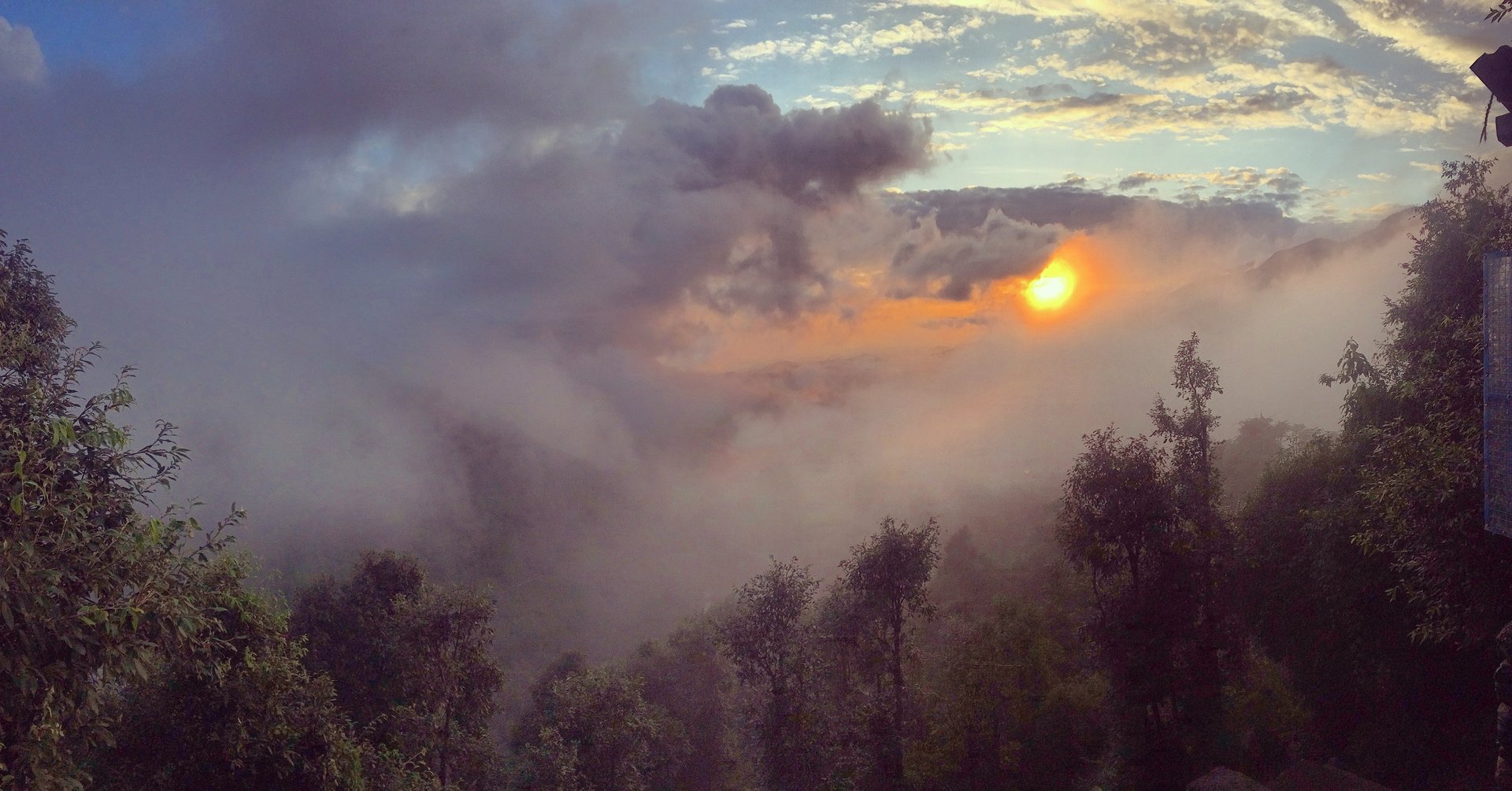 Misty sunrise over the Himalayan foothills