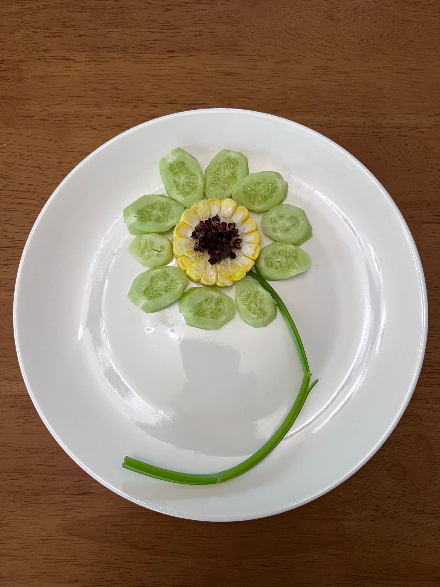 A flower composition arranged from vegetables on a plate